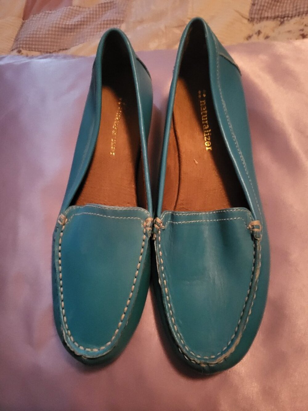Women's The image features a pair of Naturalizer Boat Shoes (new without tags)